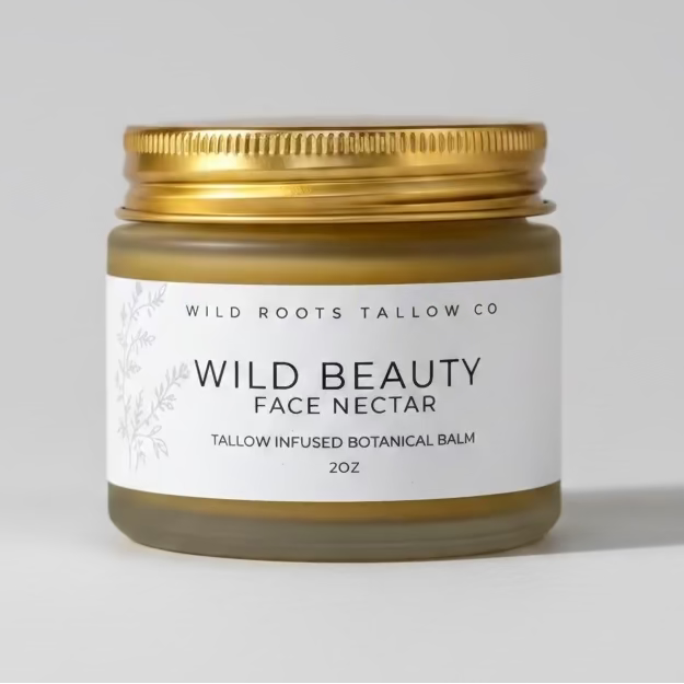 Jar of Wild Beauty Face Nectar with gold lid on a light gray background