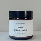 Jar of Vanilla Tallow Whip from Wild Roots Tallow Co. on a neutral background