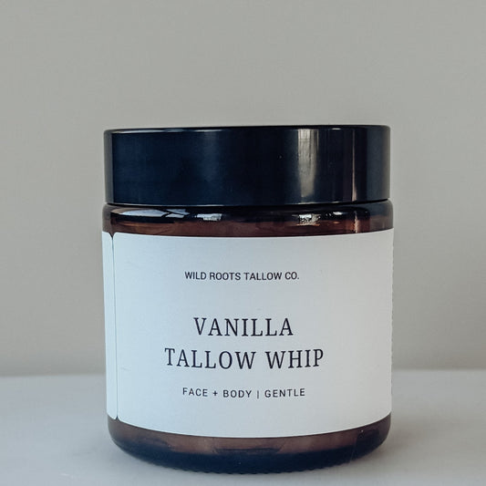 Jar of Vanilla Tallow Whip from Wild Roots Tallow Co. on a neutral background